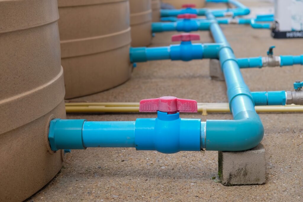 Is It Time to Replace Your Heating System Key Indicators You Shouldn’t Ignore 4 Blue water pipe installation from pump to tank.